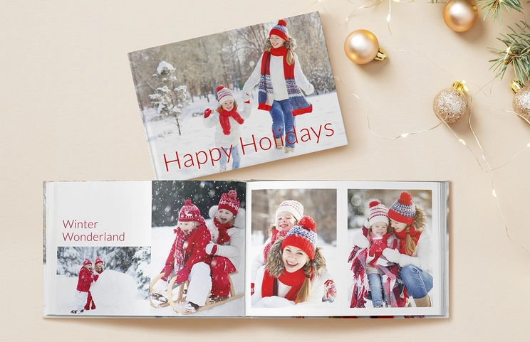 Hardcover Personalised Photo Books by Printerpix|Custom printed Printerpix photo album with hard cover and large photos of old couple|Personalised photo album book with romantic pictures of a couple and photo cover|Family photo album with custom printed cover and family name text|Pet and woman looking at personalised family photo book with custom design||||||