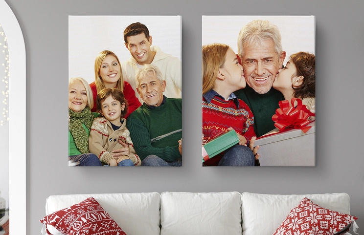 Personalised Photo Canvas Prints by Printerpix|Multiple portraits canvas|canvas print sizes|Young woman placing Printerpix custom photo canvas with photo of baby and dog on wall|bedroom with custom canvas print of a young girl and a dog|Photo collage of eight custom canvas prints of family photos and holiday scenes|||||