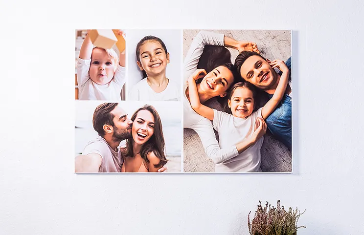 Picture collage of holiday photos on canvas print hung on wall