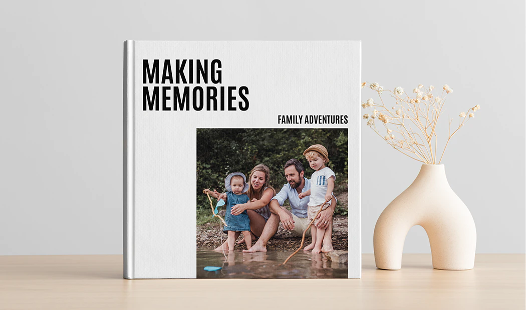 Family photo album with custom printed cover and family name text