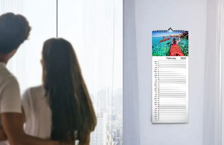 Baby photo with christmas theme design on personalised calendar by Printerpix