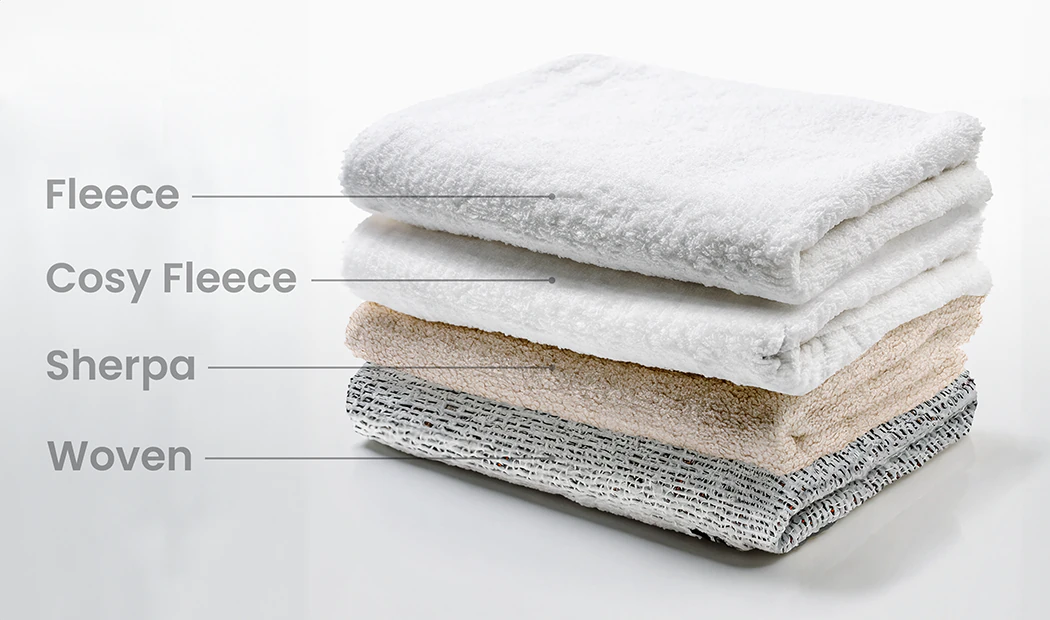 Soft fleece, cosy fleece, sherpa & woven fabrics stacked.  Personalised comfort, your perfect texture awaits.